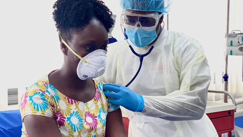 doctor examining patient