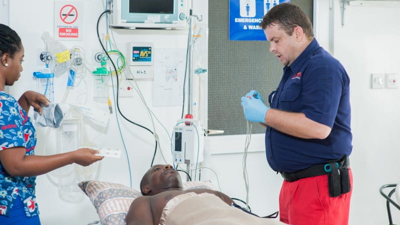 medical staff examining patient