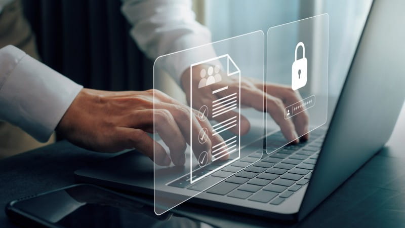 Businessmen protecting personal data on laptop