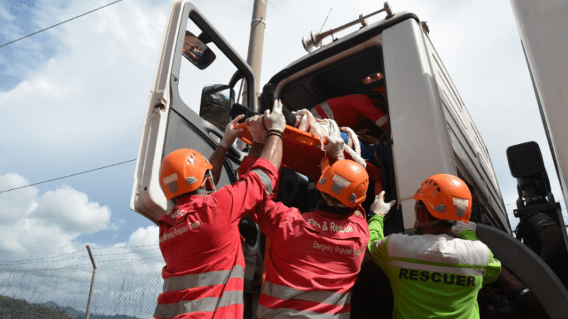 Rescuers placing patient in an ambulance